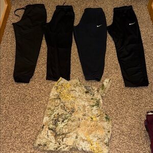 Assorted lot of men’s sweats and pair of overalls